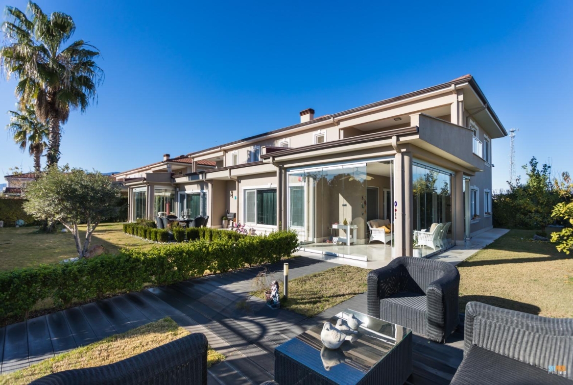 Discover the epitome of opulent living in this Luxury Special Interior Design Duplex Villa, nestled in the serene and picturesque district of Döşemealtı, Antalya.